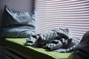 079045753-by KANZEFARcrumpled-pillow-and-blanket-wi